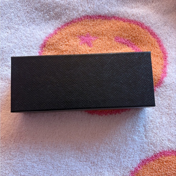 Prada empty box. Black exterior. Silver Prada logo front of box. - Picture 2 of 3